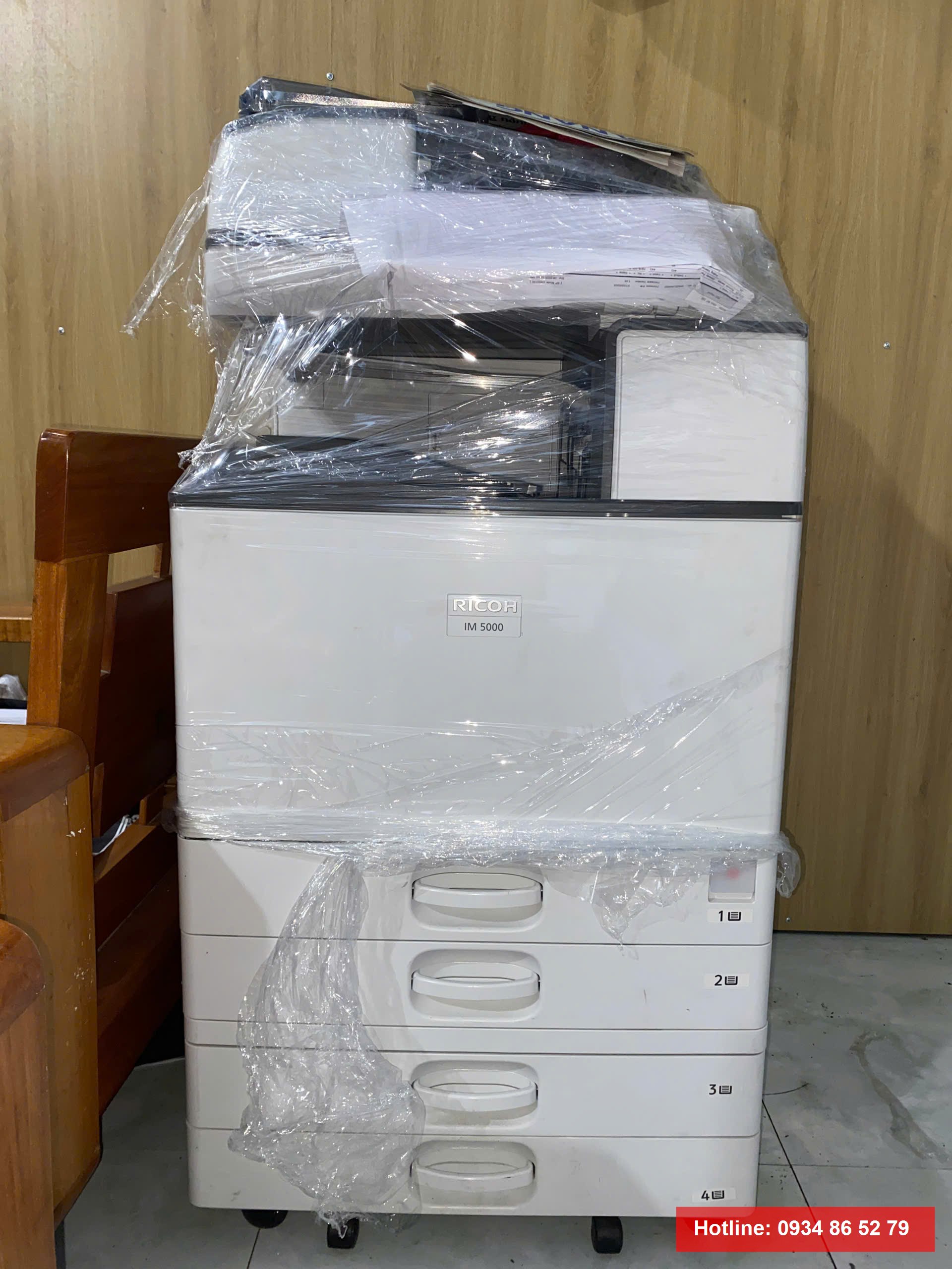 Máy photocopy Ricoh được đóng gói trước khi giao tại Thanh Khê